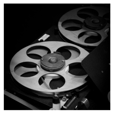 Computer tape reel machine