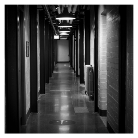 Long internal corridor with lighting from above