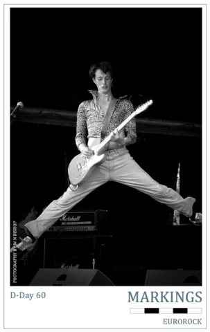 D-Day 60 Markings Series - EUROROCK Singer and guitarist Mark(?) from the Portsmouth band Common Revolt jumps in the air during the EuroRock concert