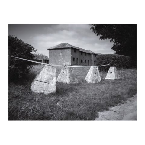 'Dragons Teeth' antitank defences in front of 'House-like' buildings constructed to aid urban warfare training