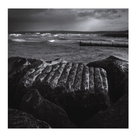 Aberaeron Costal Defence Scheme - rock armour boulder in stormy weather